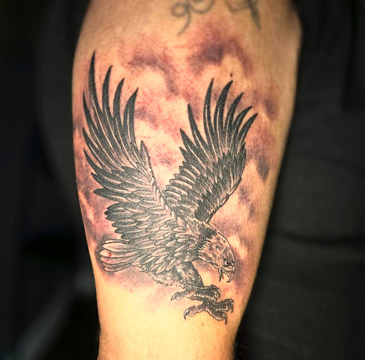 Explore rainbow bridge tattoo ideas, creative tattoo ideas in Fort Myers, available at Loyal 2 The Coil Tattoos & Piercings (Edison Mall Location Entrance F)