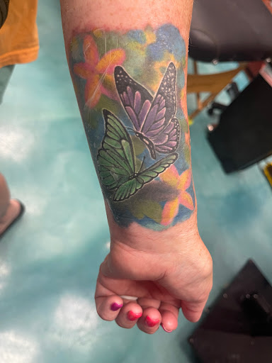 Explore tattoo ideas breast cancer, creative tattoo ideas in Honolulu, available at Aloha Tattoo Waikiki Hilton Hawaiian Village Rainbow Bazaar