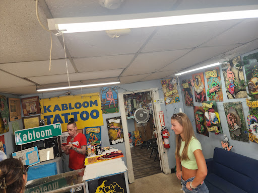 Explore bonnie and clyde tattoo ideas, creative tattoo ideas in Cranston, available at Kabloom Tattoo Studio