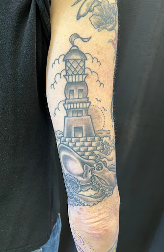 Explore eagle scout tattoo ideas, creative tattoo ideas in Houston, available at The Electric Chair Tattoo & Piercing