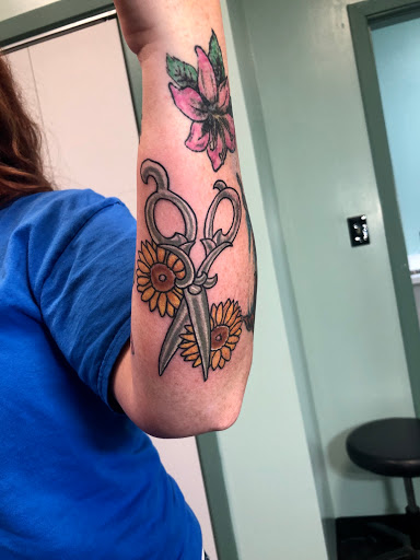 Explore love hate tattoo ideas, creative tattoo ideas in Meridian, available at Creative Pain Tattoo Studio