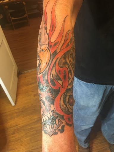 Explore tattoo ideas for bipolar disorder, creative tattoo ideas in Milford, available at Golden Hammer Tattoo Studios