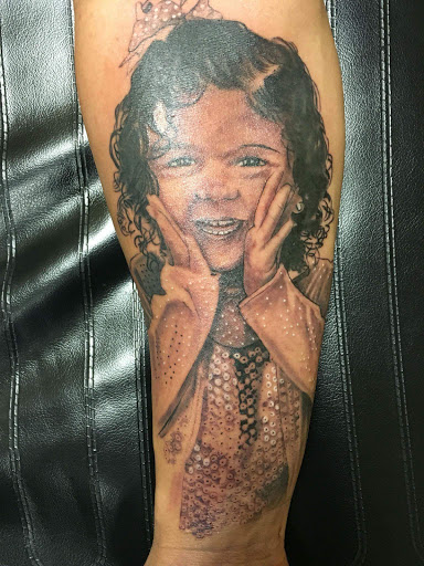 Explore girly half sleeve tattoo ideas for females, creative tattoo ideas in Savannah, available at Tatlyfe Studios