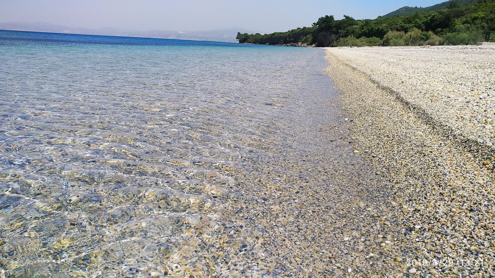 Fotografija Aydinlik Koyu z modra čista voda površino