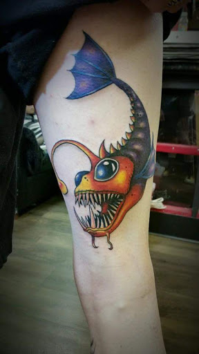 Explore dog tag tattoo ideas, creative tattoo ideas in Albany, available at DieHard Piercing & Tattoo Studio