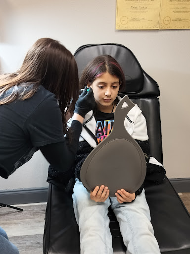 Explore women back tattoo ideas, creative tattoo ideas in Oviedo, available at Fine Ink Studios Tattoos