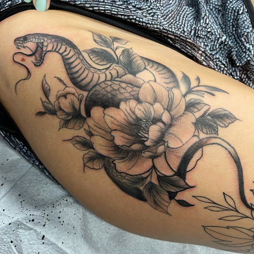 Find between the breast tattoo ideas for your next unique tattoo in Buffalo at True Gloom Tattoo Studio