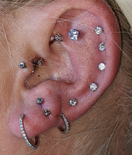 Explore snowmobile tattoo ideas, creative tattoo ideas in Minocqua, available at Lotus Piercing