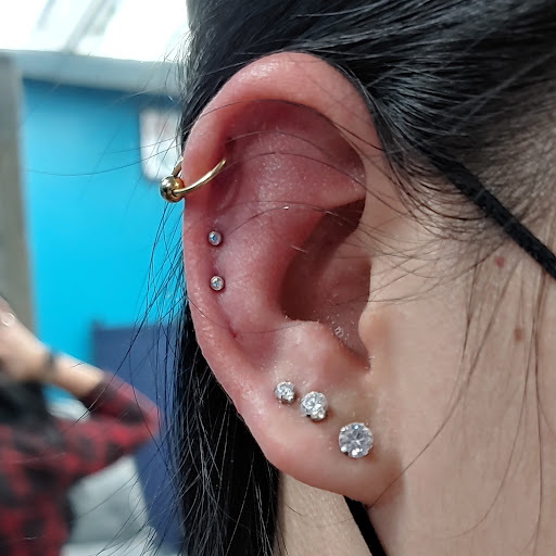 Explore tattoo ideas pin up, creative tattoo ideas in San Marcos, available at Ollie the Impaler Body Piercing