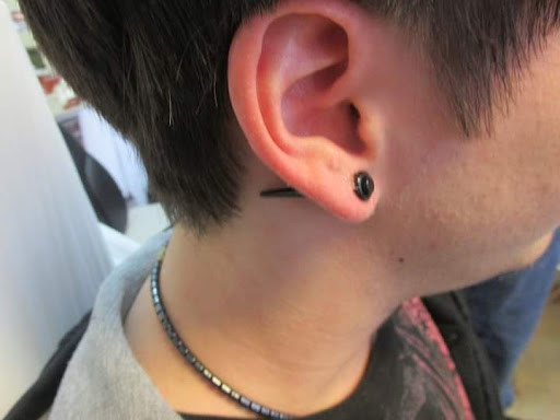 Explore cancun tattoo ideas, creative tattoo ideas in Elko, available at Custom Tattoos and Body Piercing Studio