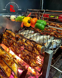 Barbecue du Restaurant halal Ma Poule Grillée - Poulet braisé au feu de bois à Argenteuil - n°13