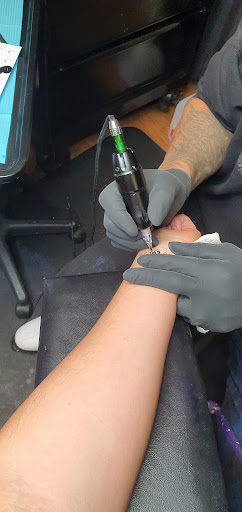 Explore good family tattoo ideas, creative tattoo ideas in Glen Burnie, available at Dragon Moon Tattoo Studio Inc