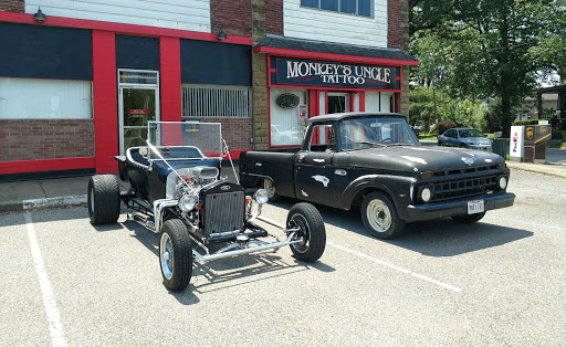 Explore leg sleeve tattoo ideas for women, creative tattoo ideas in Marietta, available at Monkeys Uncle Tattoo