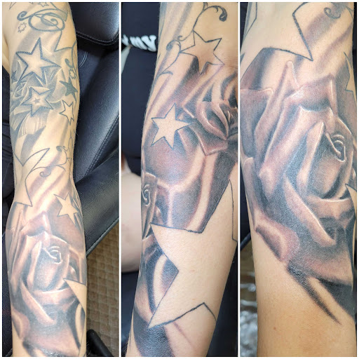 Explore dog love tattoo ideas, creative tattoo ideas in Angola, available at Hoodlum Ink