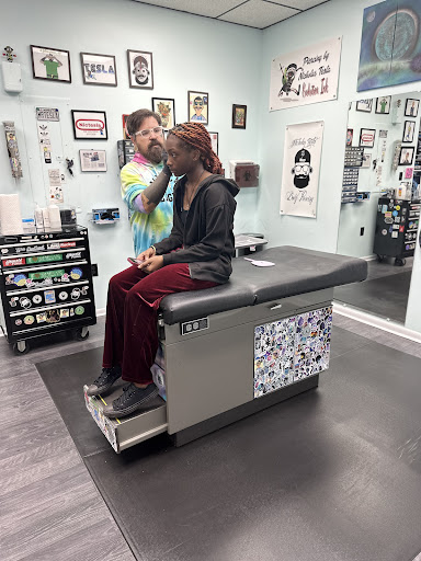 Explore griffin tattoo ideas, creative tattoo ideas in Fayetteville, available at Evolution Ink Tattoo and Piercing Studio