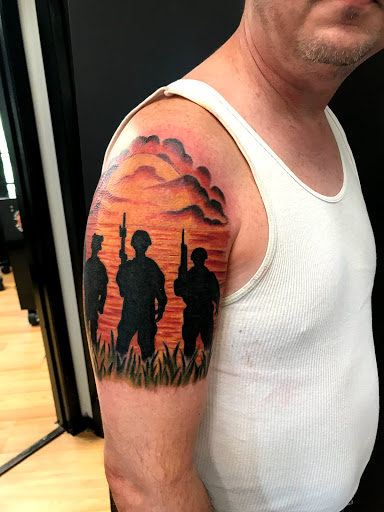 Explore knee tattoo ideas for men, creative tattoo ideas in Tarpon Springs, available at Legendary Custom Tattoos and Piercings