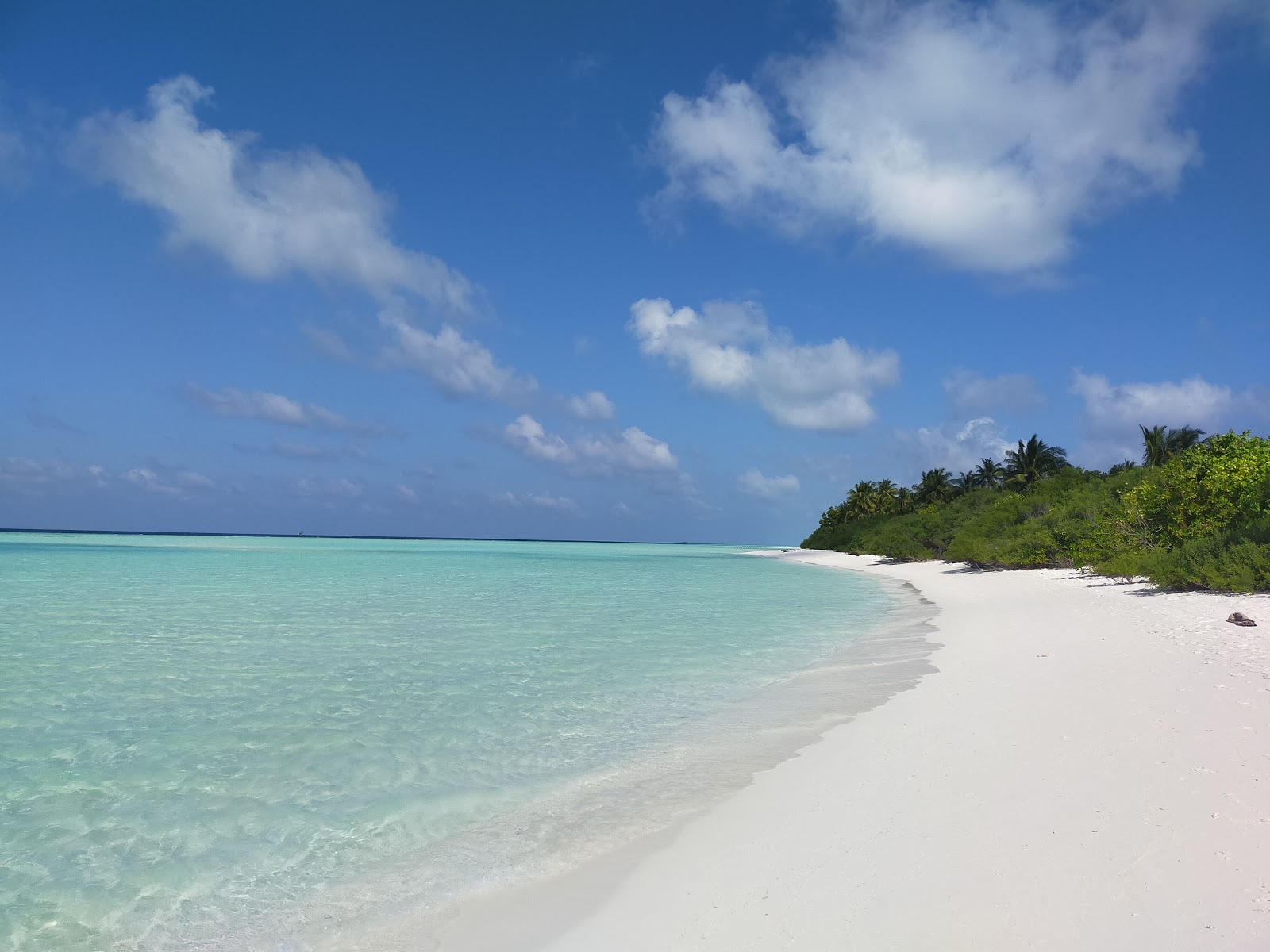 Foto av Bodumohora Stranden med vit fin sand yta