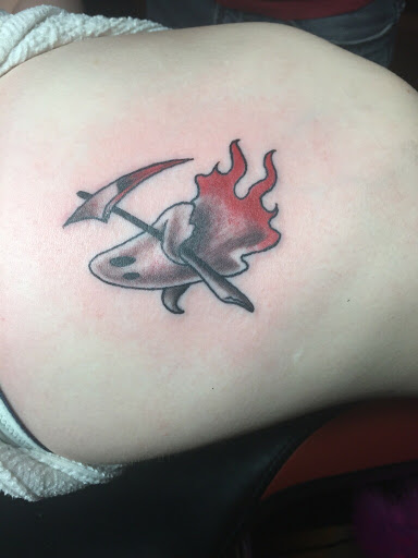 Explore tattoo ideas on tricep, creative tattoo ideas in Linden, available at Fredricks Tattoo Gallery