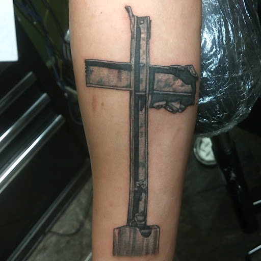 Explore tattoo name cover up ideas, creative tattoo ideas in Lagrangeville, available at Black Cherry Tattoo Studio NY