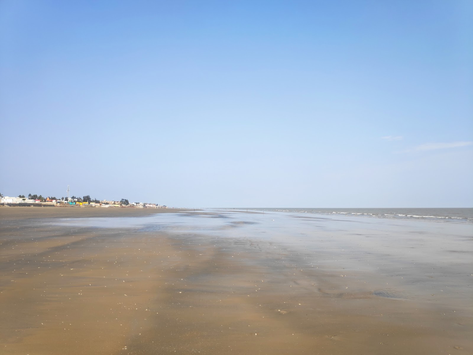Photo de Mandarmani Beach avec l'eau cristalline de surface