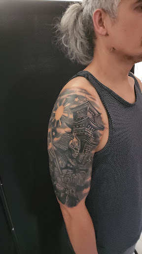 Explore tattoo ideas mother and son, creative tattoo ideas in Conroe, available at Nicoles Tattoos and Piercings