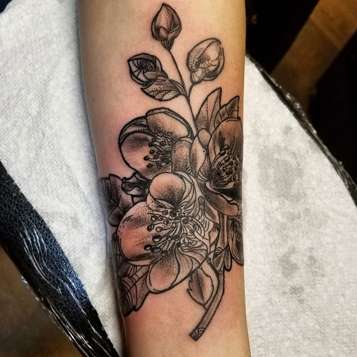 Explore anime hand tattoo ideas, creative tattoo ideas in Cumberland, available at Queen City Ink