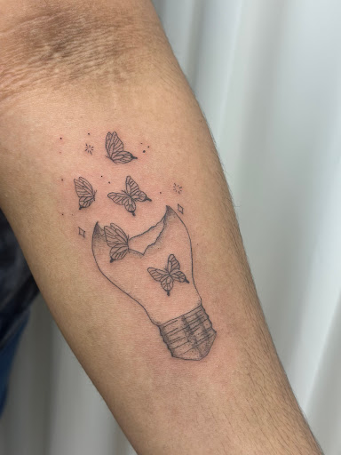 Explore face tattoos ideas, creative tattoo ideas in Sarasota, available at Diamond Reigns Tattoos