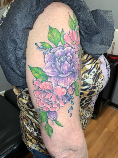 Explore outlaw tattoo ideas, creative tattoo ideas in Kirksville, available at Bedford Legacy Tattoo and Body Piercing