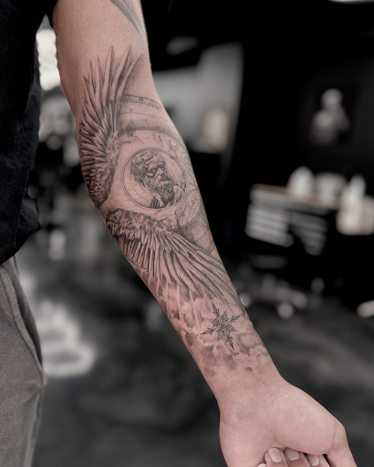 Explore floral sleeve tattoo ideas, creative tattoo ideas in Hollywood, available at Sacred Eye Tattoos