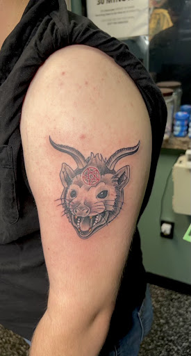 Explore vertical tattoo ideas, creative tattoo ideas in Meridian, available at Creative Pain Tattoo Studio