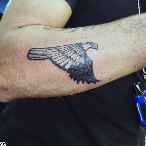 Explore redeemed tattoo ideas, creative tattoo ideas in Englewood, available at The Original Big Daddy Tattoo & Body Piercing est.1997 est.1997