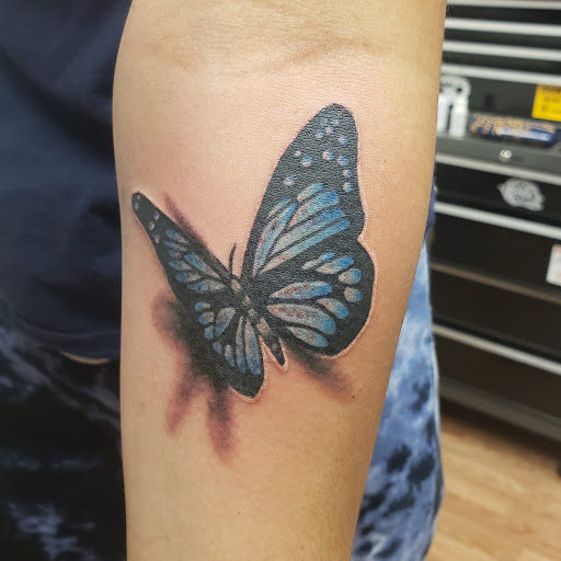 Explore tattoo flower ideas, creative tattoo ideas in Export, available at Patriotic pain tattoo