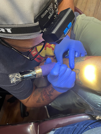 Explore family crest tattoo ideas, creative tattoo ideas in Clarksville, available at Dark Raine Tattoo