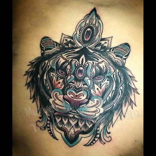 Explore small hand tattoo ideas, creative tattoo ideas in Bowling Green, available at Murder Ink Tattoo Co.