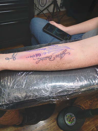 Find tattoos under the breast ideas for your next unique tattoo in Port Orange at Port Orange Tattoo and Art Parlor