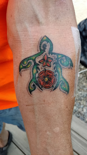 Explore ear tattoo ideas for females, creative tattoo ideas in Bangor, available at Body Graphics Tattoo & Piercing Studio