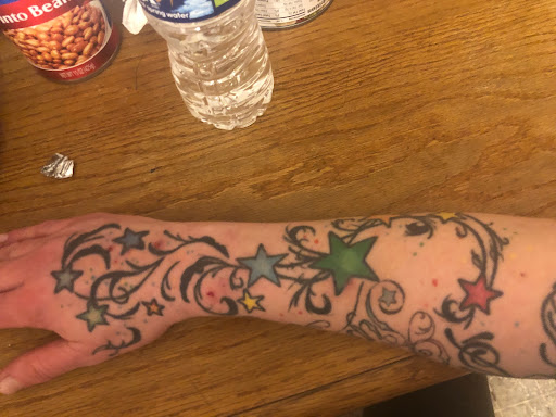 Explore tattoo ideas for the back of the neck, creative tattoo ideas in Cleveland, available at True Art Tattoos, Inc