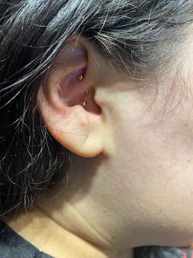 Explore unique side thigh tattoo ideas, creative tattoo ideas in Milford, available at Karma