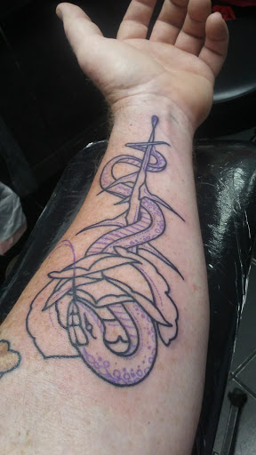 Explore cherub tattoo ideas, creative tattoo ideas in Gainesville, available at Bodytech Tattooing & Piercing
