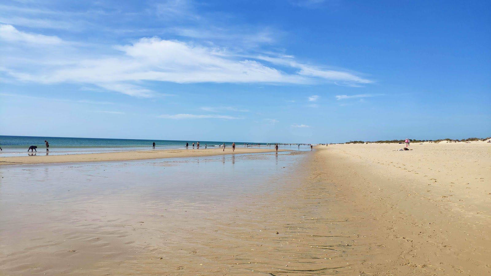 Foto van Manta Rota Strand met helder fijn zand oppervlakte