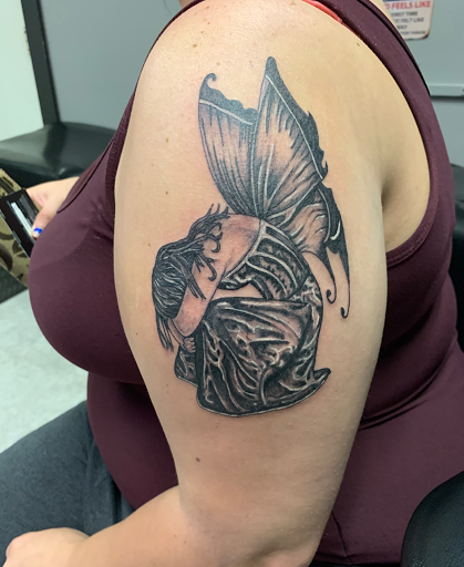 Explore cat tattoo ideas for guys, creative tattoo ideas in Hudson Falls, available at ALTERED ADDICTION TATTOOS