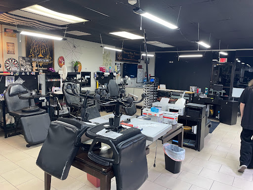 Explore last name back tattoo ideas, creative tattoo ideas in Sarasota, available at SEVEN SINS Tattoo Studio