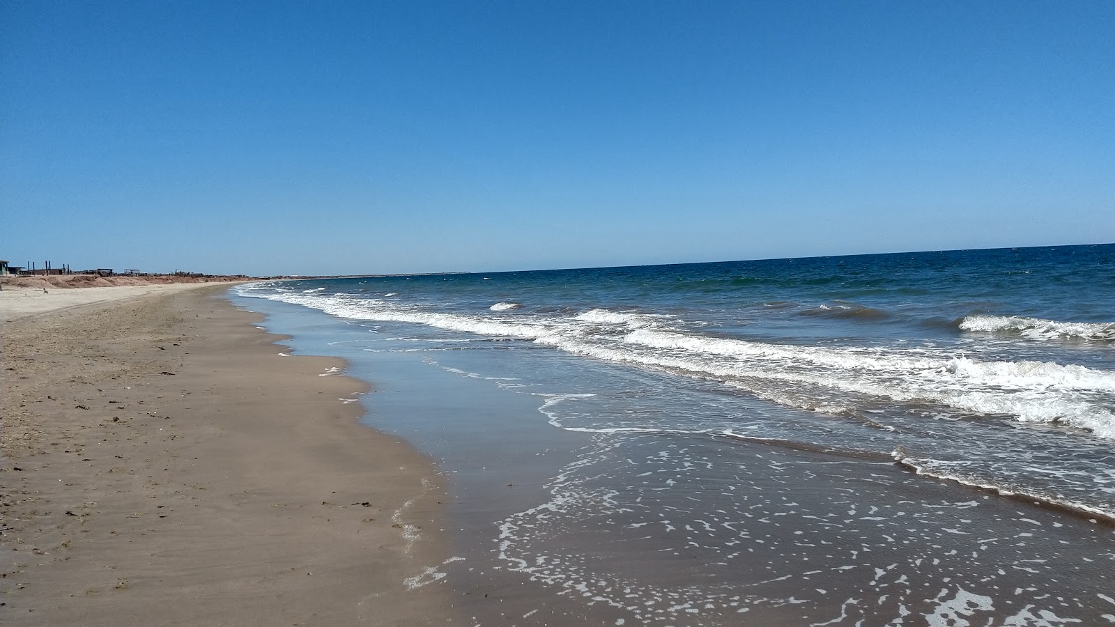 Photo de Bachoco beach avec l'eau turquoise de surface