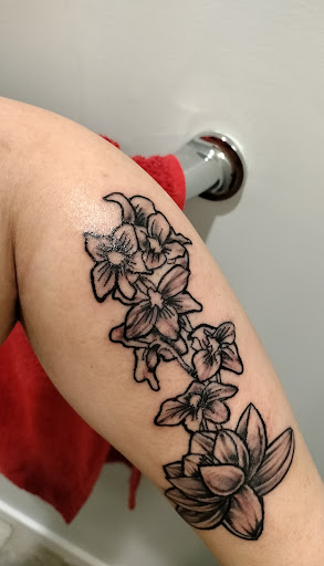 Explore mother and son tattoos ideas, creative tattoo ideas in Hampton, available at Blue Horseshoe Tattoo and Body Piercing