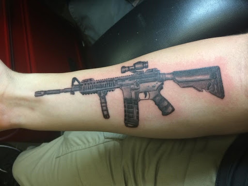 Explore tattoo ideas for athletes, creative tattoo ideas in Savannah, available at Tatlyfe Studios