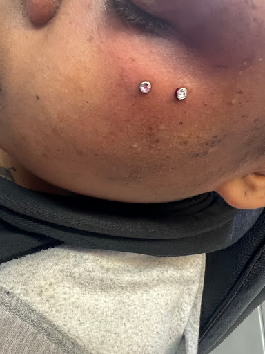 Explore infinity heart tattoo ideas, creative tattoo ideas in Milwaukee, available at Piercing by Dani Real Ink Tattoo Studio