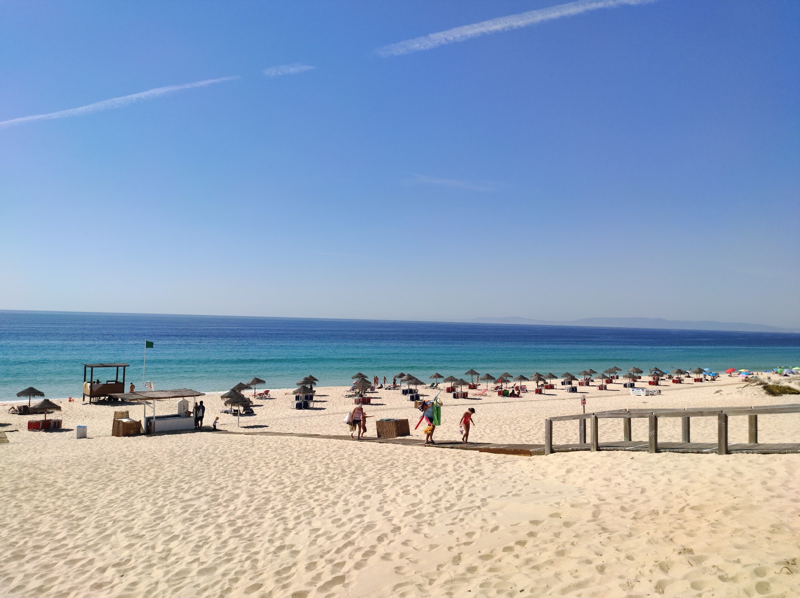 Photo of Comporta Beach with turquoise pure water surface