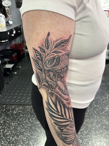 Explore letter tattoo cover up ideas, creative tattoo ideas in Fort Myers, available at Loyal 2 The Coil Tattoos & Piercings (Edison Mall Location Entrance F)