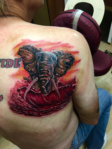 Explore butterfly leg tattoo ideas, creative tattoo ideas in Anniston, available at Infinity Ink