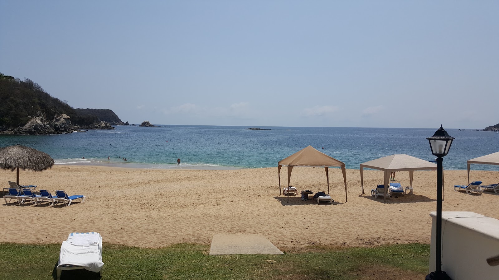 Photo of Tangolunda beach II and the settlement